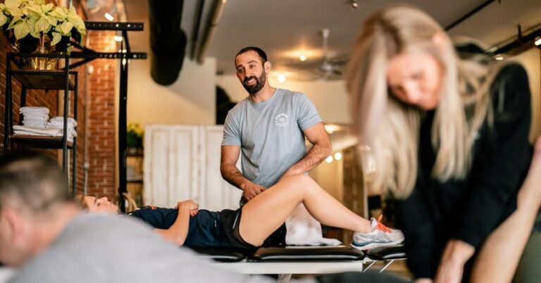 Physical therapist discussing physical therapy appointments with a patient
