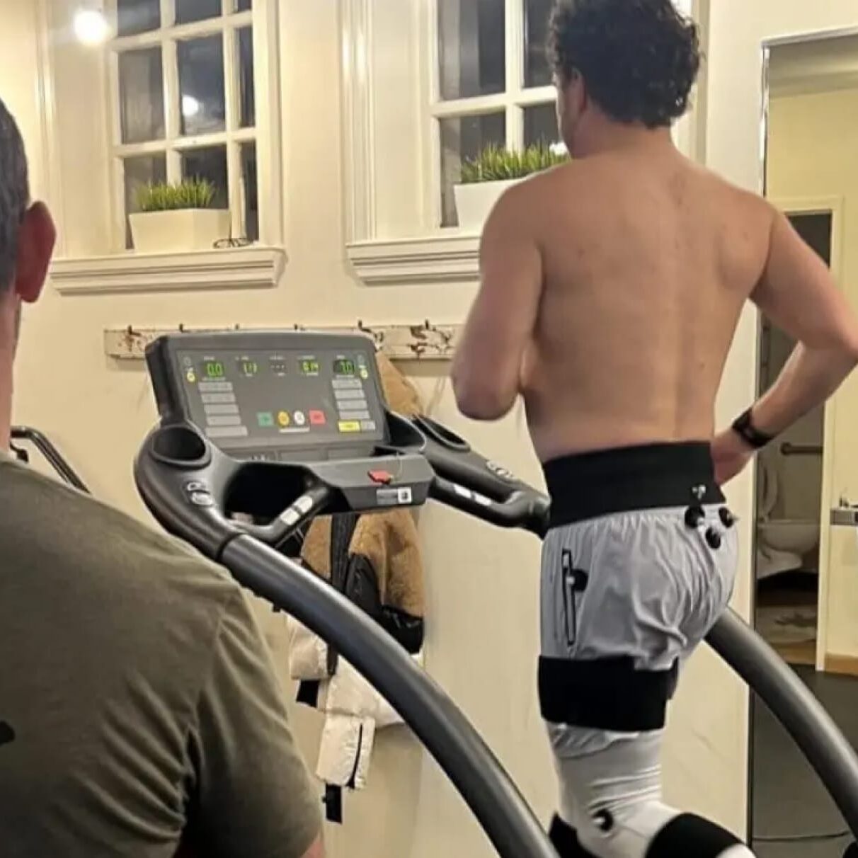 Gait Analysis Dr. Eric Abramowitz conducting a gait analysis with a patient, assessing movement patterns to optimize performance and prevent injury.