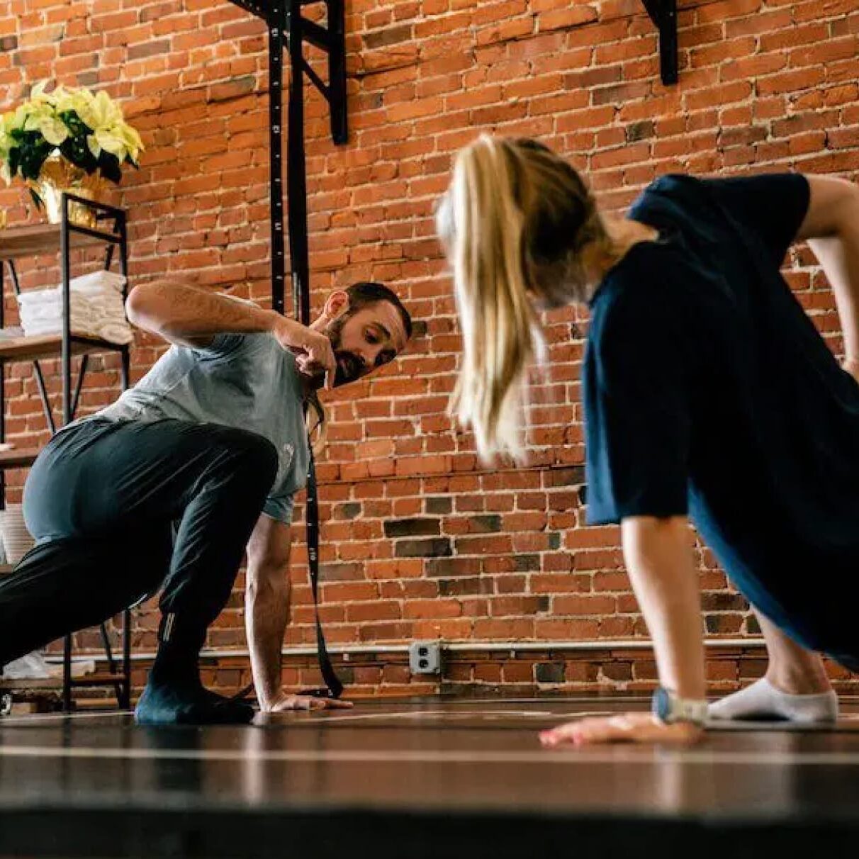 Dr. Eric Abramowitz assisting a patient with postural correction therapy, focusing on alignment techniques to improve posture and reduce discomfort.