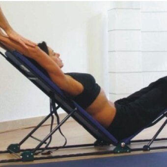 patient working with physical therapist on postural correction